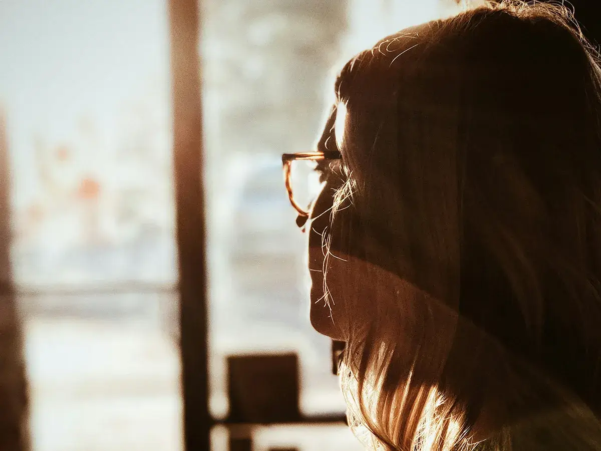 Who Can Diagnose ADHD? A woman looking out a window
