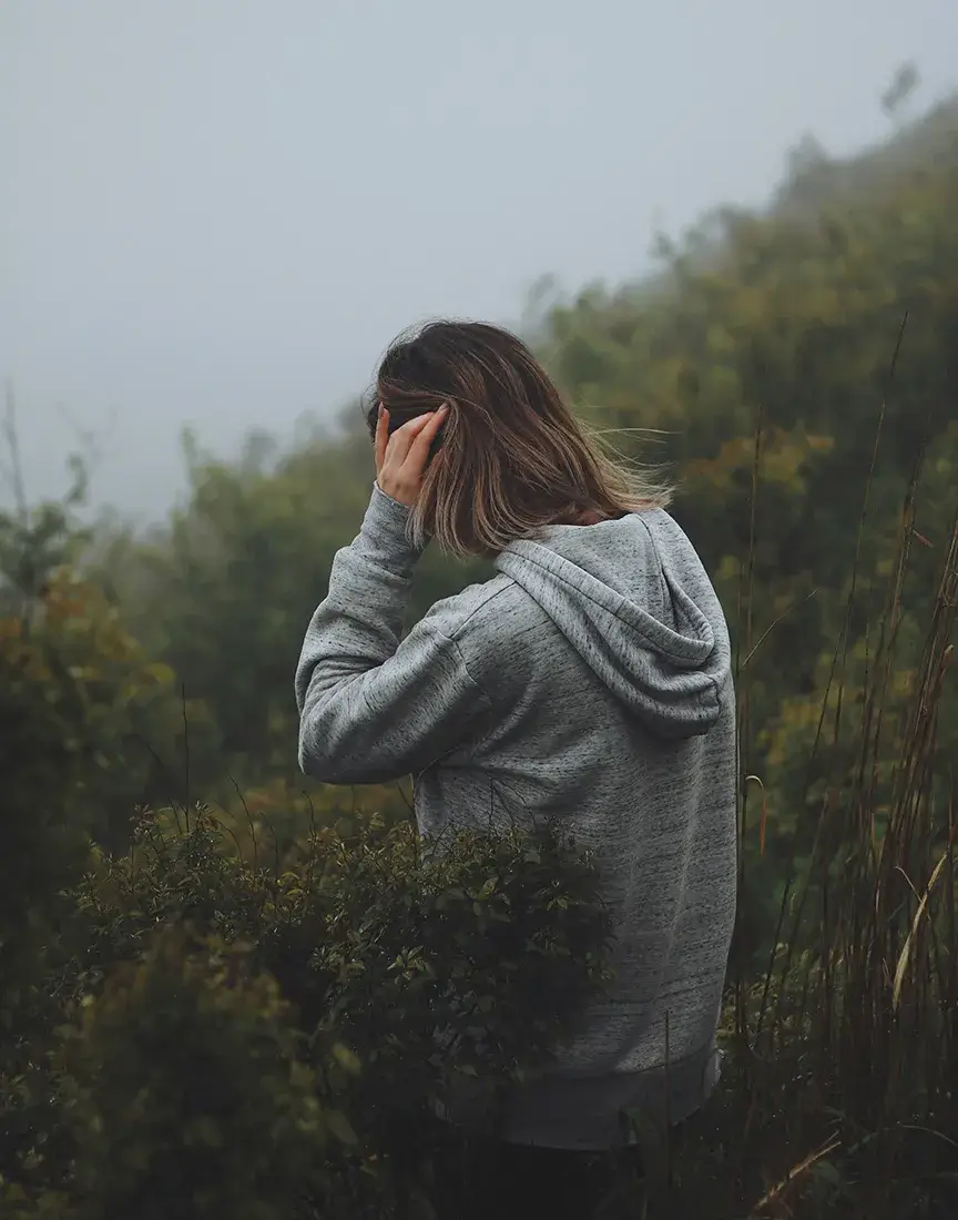 Anxiety Storm Woman outside in cloudy weather