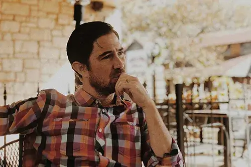 Man Sitting Outside Man Sitting Outside