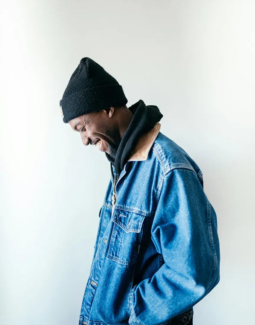 Partner in Comprehensive Treatment Man in denim jacket smiling