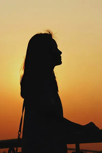 Resilient Anxiety Support Woman outside at sunrise