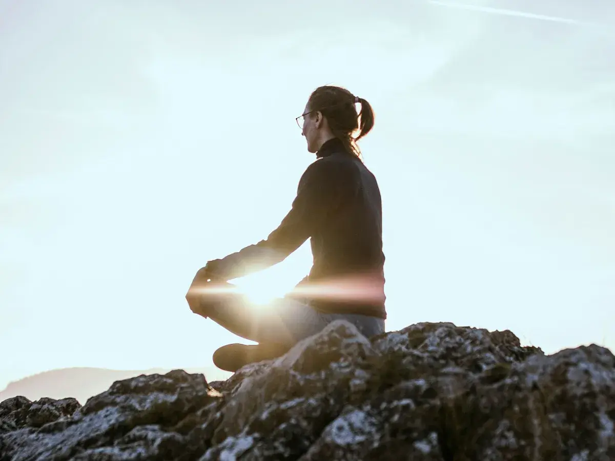 bipolar-depression-treatment-plans A woman meditating on bipolar depression treatment options