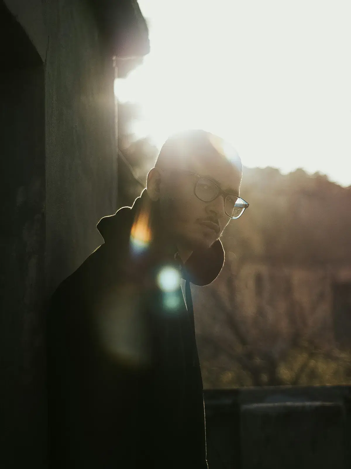 whats-the-difference A man looking with the sun in the background