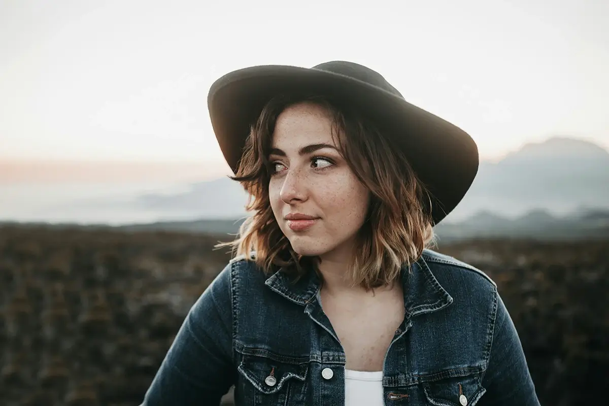 How Long Do Bipolar Depressive Episodes Last? A woman wearing a hat